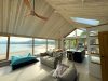 Idyllic beach house and setting in the Seychelles designed by leading Welsh architects Downs Merrifield.